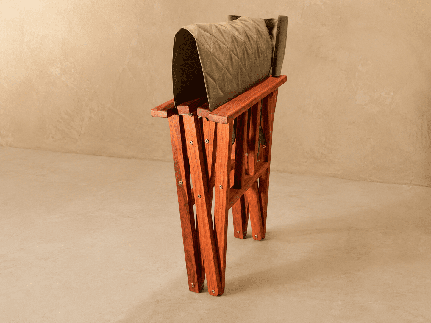 Safari Camp Director's Chair Side Facing Closed Folded safari camp director's chair with quilted safari green ripstop canvas