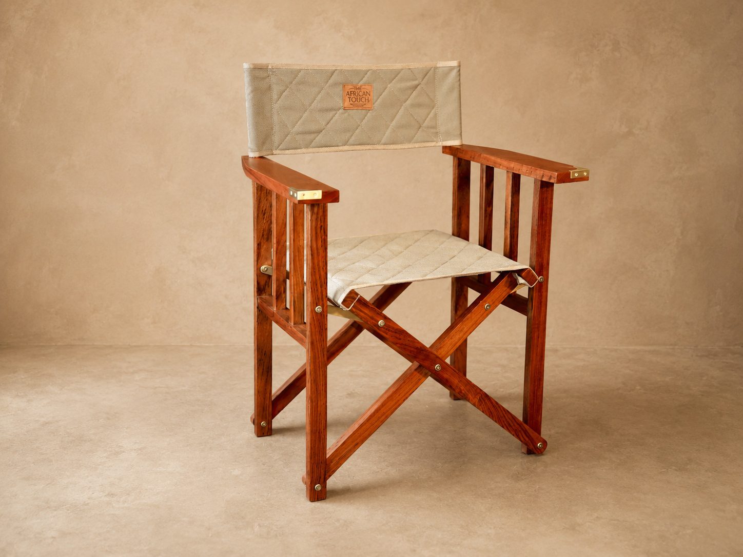The Sabi Luxury Director's Chair Side Facing with brass fittings The Sabi Luxury Director's Chair with solid brass corners and hinges.