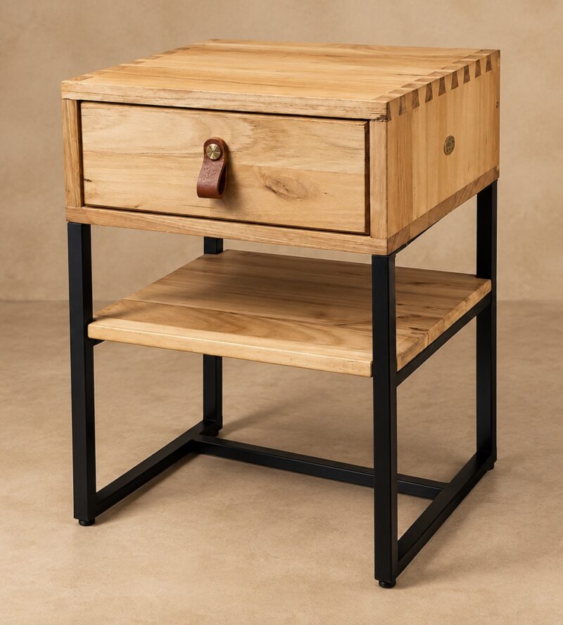 Samanzi Bedside Table in hardwood and black steel with drawer, leather pull and open lower shelf.